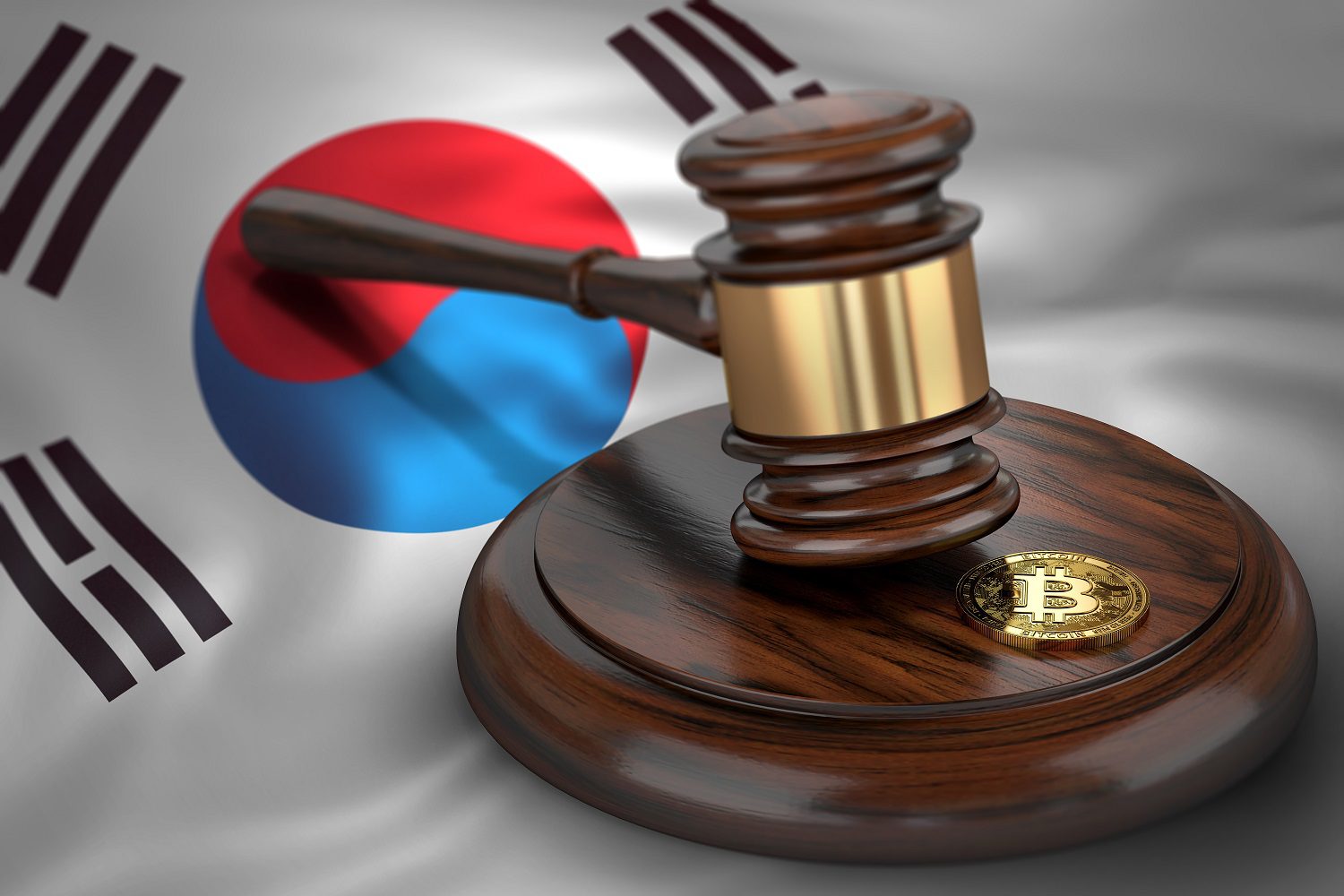 Un token destinado a representar Bitcoin y el mazo de un juez contra el fondo de la bandera de Corea del Sur.
