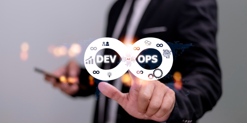 A man in a suit is pointing at a devops icon.