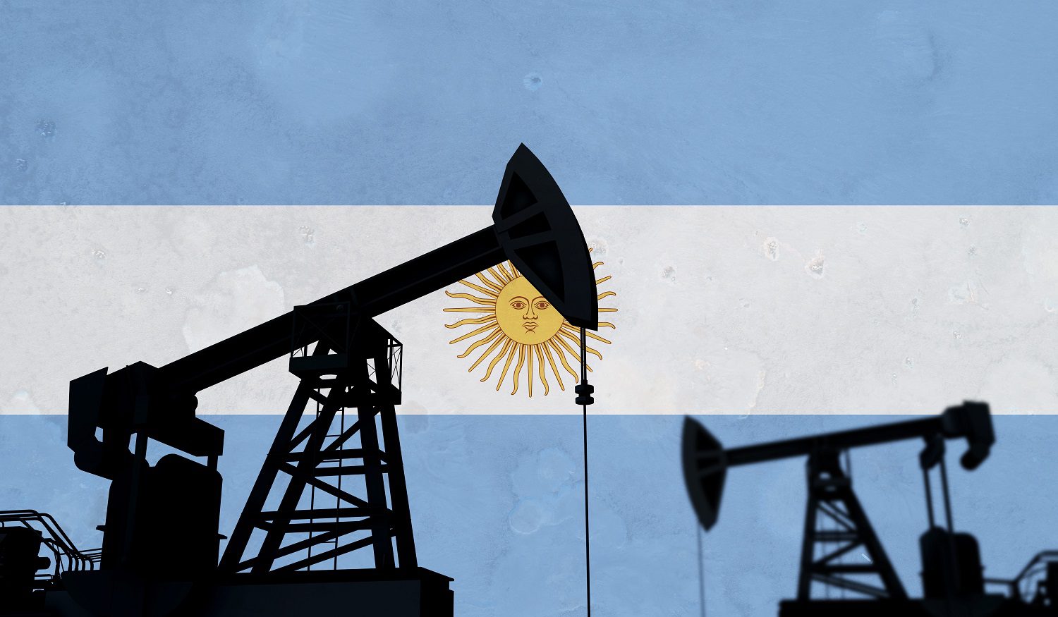 Siluetas de la bomba de aceite en el fondo de la bandera argentina.