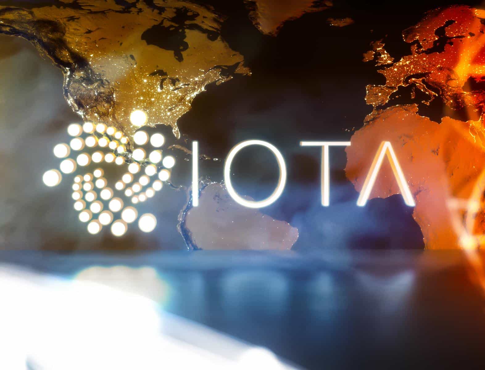 Logotipo de IOTA con fondo de mapa mundial translúcido.