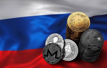 Piles-of-cryptocurrencies-on-Russian-flag