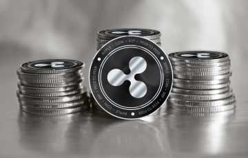 Ripple-XRP-silver-coins-with-a-gray-background