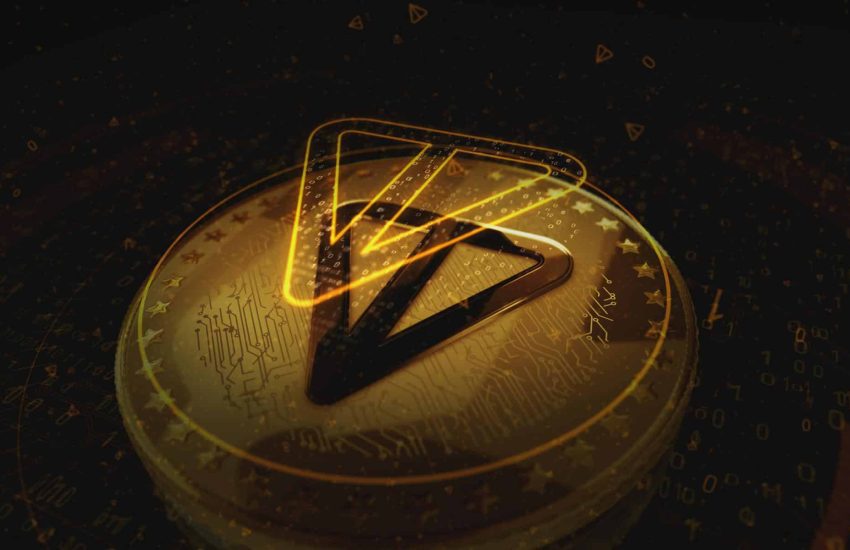 Toncoin-TON-gold-logo-on-a-dark-background