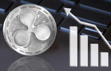 Ripple-XRP-Price-rising-in-gray-format-with-a-keyboard-background