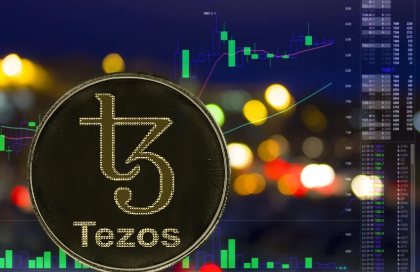 Tezos-XTZ-logo-with-background-of-trading-price-charts