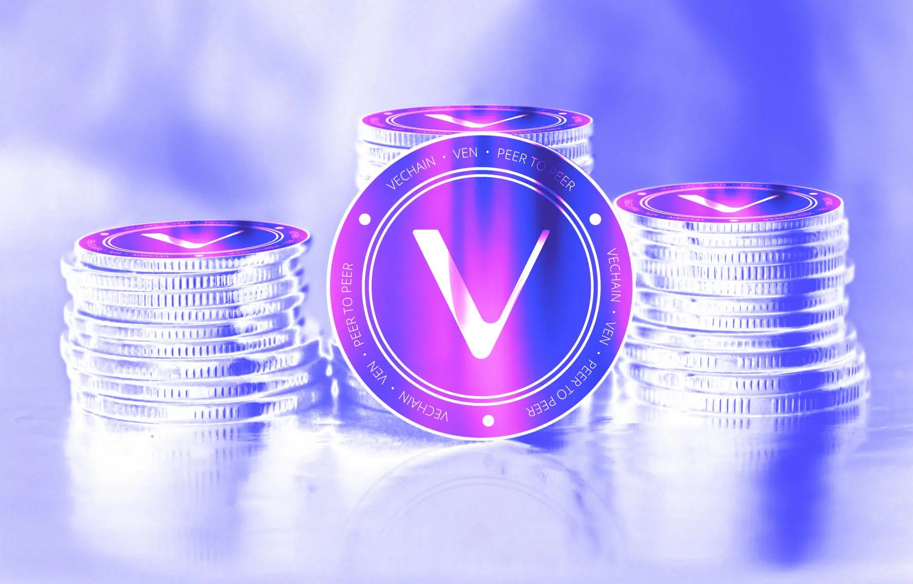 VeChain-VET-monedas-sobre-fondo-blanco